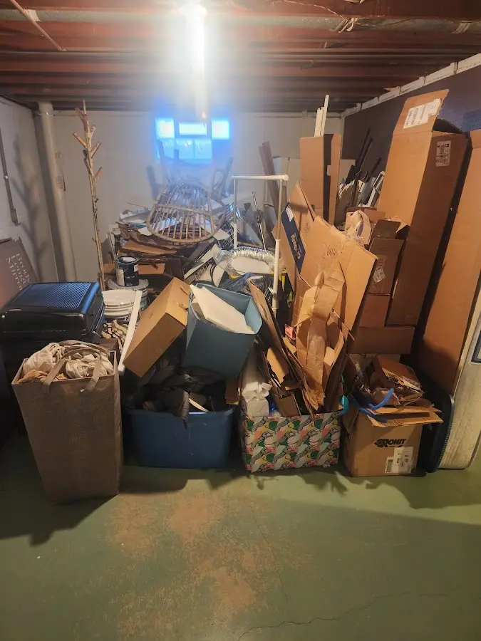 Roll-off dumpster container at job site for 15 Yard Dumpster Rental in Merchantville